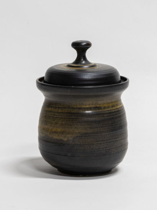 A ceramic fermentation pot with a lid, in a matte black glaze. Handmade in Australia at Valla Beach NSW. 